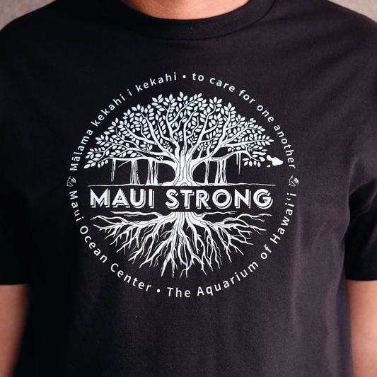 Maui Strong T-shirt, white graphic on black shirt. Locally designed and printed. Sales donated to Hawaiʻi Community Foundationʻs Maui Strong Fund, which support people impacted & displaced by the Maui wildfires.